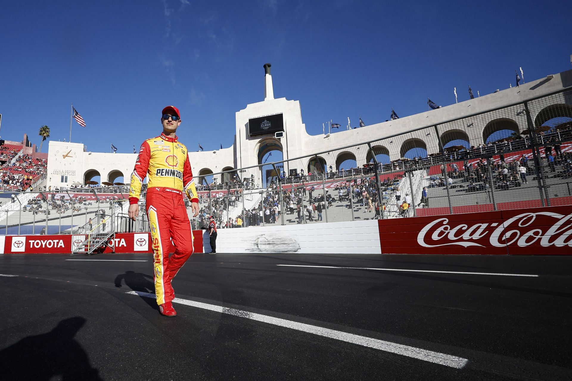 Joey Logano walks the track before the NASCAR Cup Series Busch Light Clash
