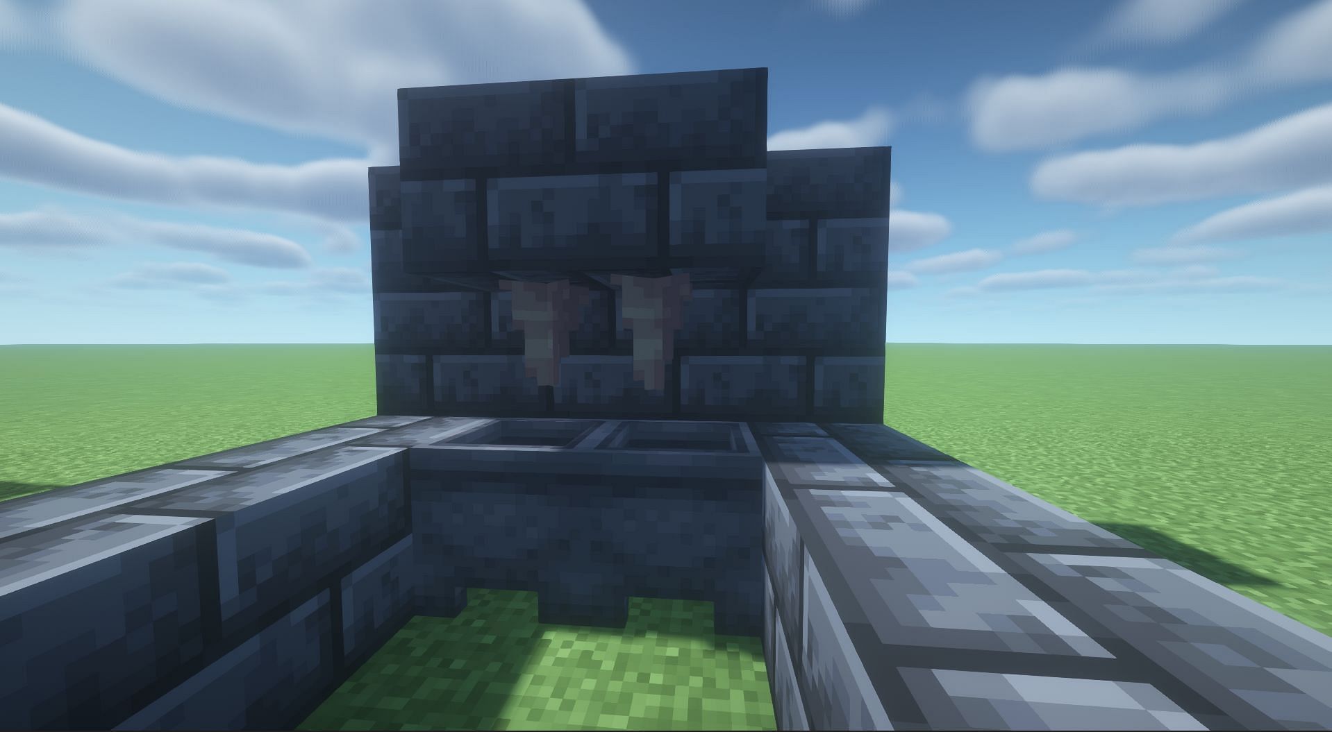Setup the pointed dripstone and cauldron (Image via Minecraft)