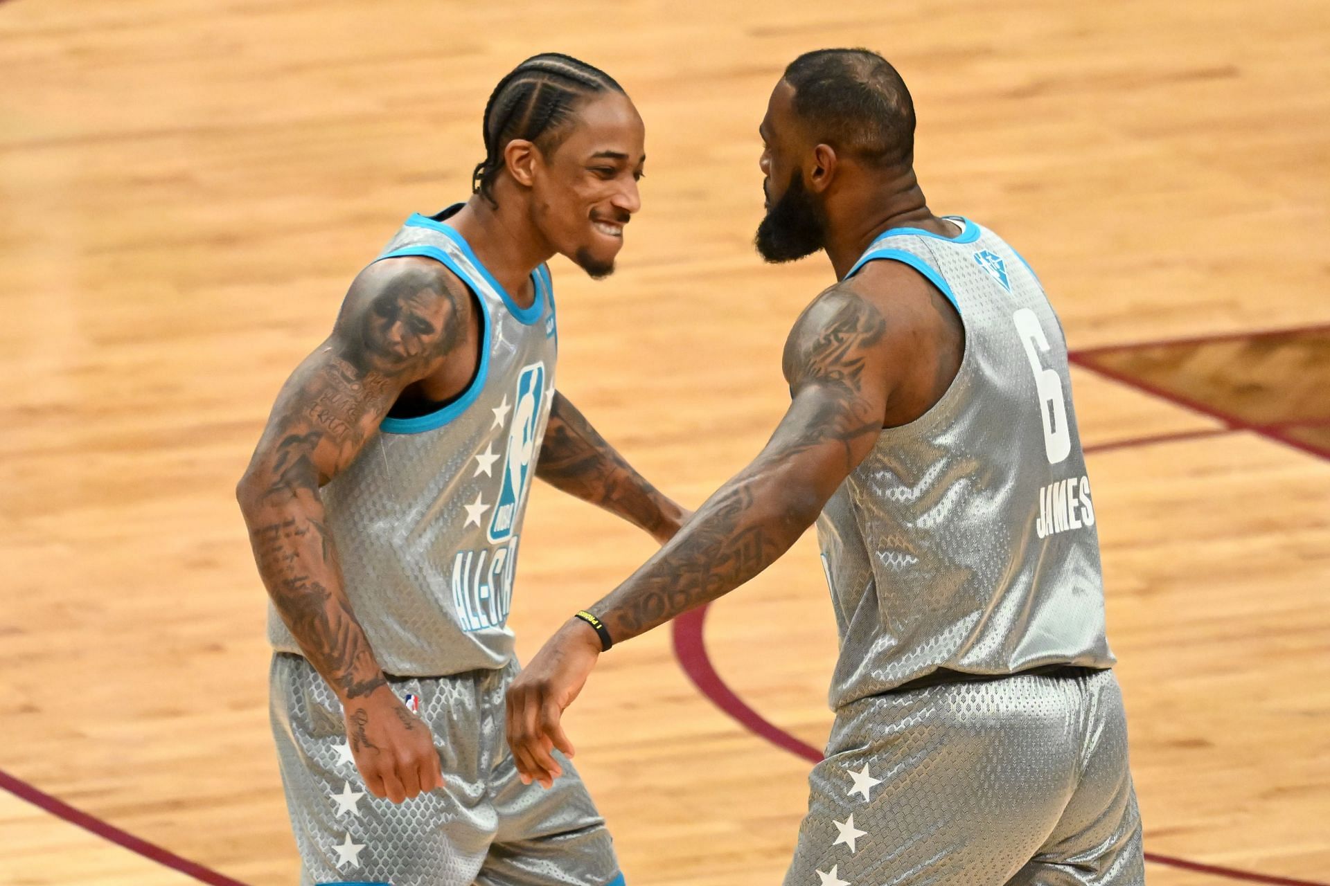 DeMar DeRozan #11 and LeBron James #6 of Team LeBron celebrate after defeating Team Durant 163-160.