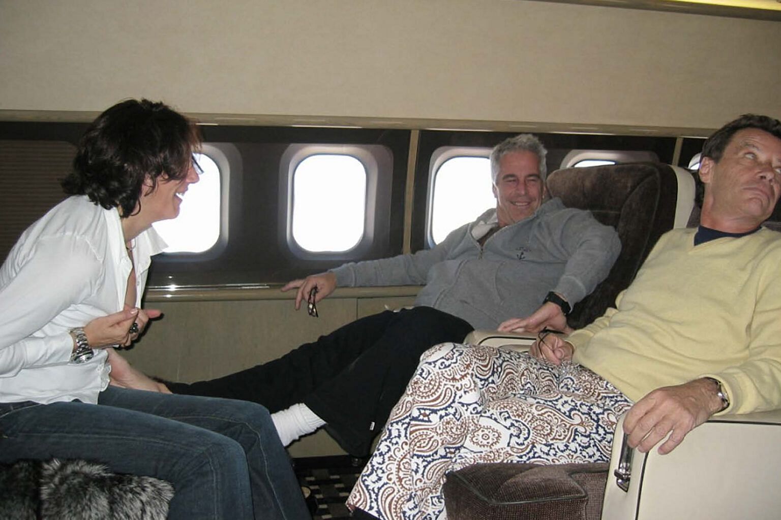 Jean Luc Brunel on a private jet with Ghislaine Maxwell and Jeffrey Epstein (Image via Shutterstock)