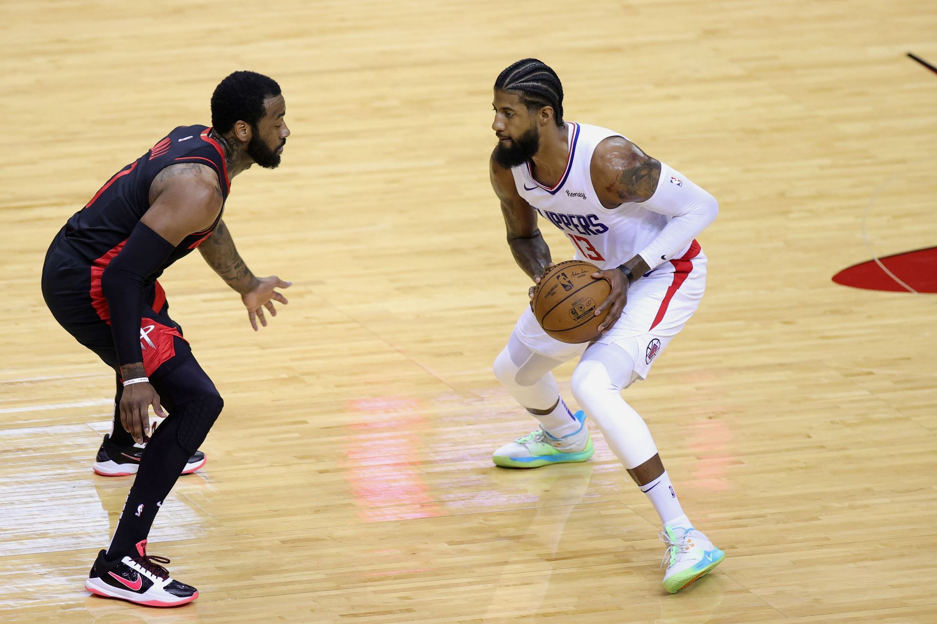 Paul George of the LA Clippers against John Wall of the Houston Rockets during the 2020-21 NBA season