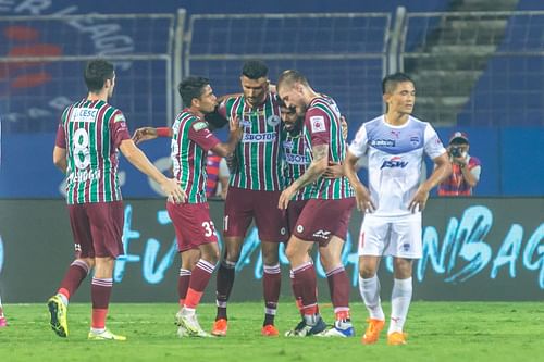 Enter caption Enter caption Bengaluru FC's Sunil Chhetri dejected as ATK Mohun Bagan's players celebrate a goal. (Image Courtesy: ISL Media)