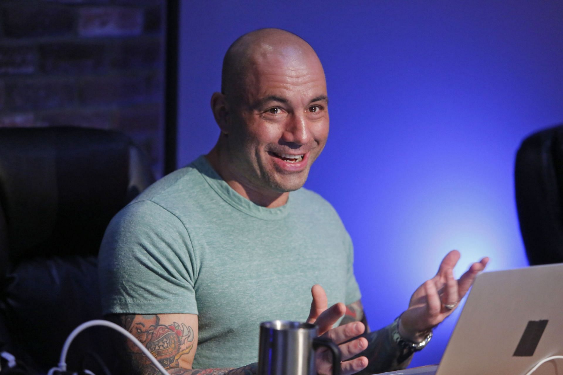 Joe Rogan on his JRE podcast (Image via SYFY/Getty Images)