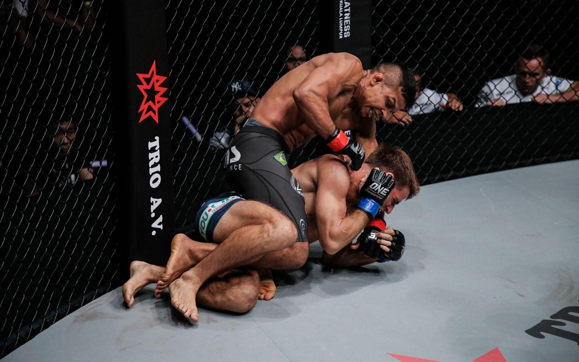 ONE bantamweight champion Bibiano Fernandes (top) will look to defend his title against bitter rival John Lineker at ONE: Bad Blood. (Image courtesy of ONE Championship)