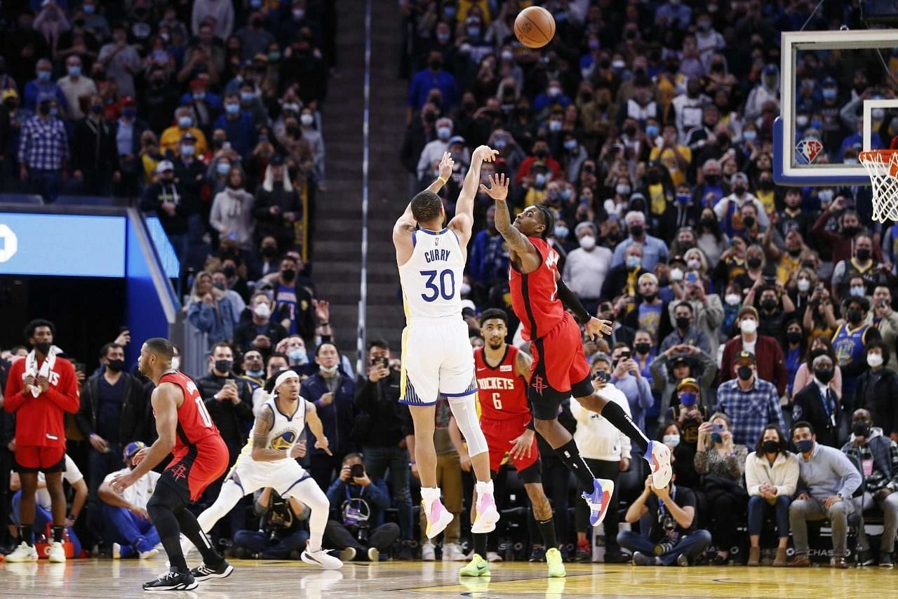 Stephen Curry shoots over Kevin Porter Jr. during the Golden State Warriors&#039; win over the Houston Rockets: [Credits: San Francisco Chronicle]