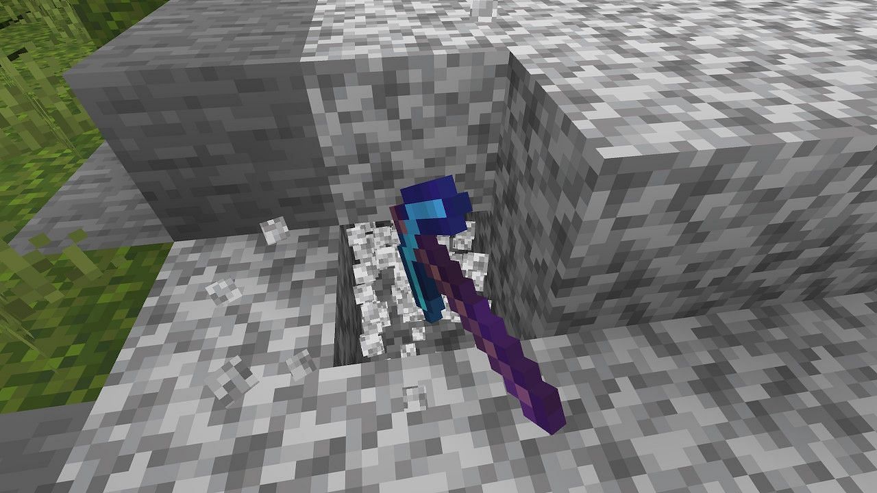 Pickaxes can gather materials much easier when enchanted with efficiency (Image via Minecraft)