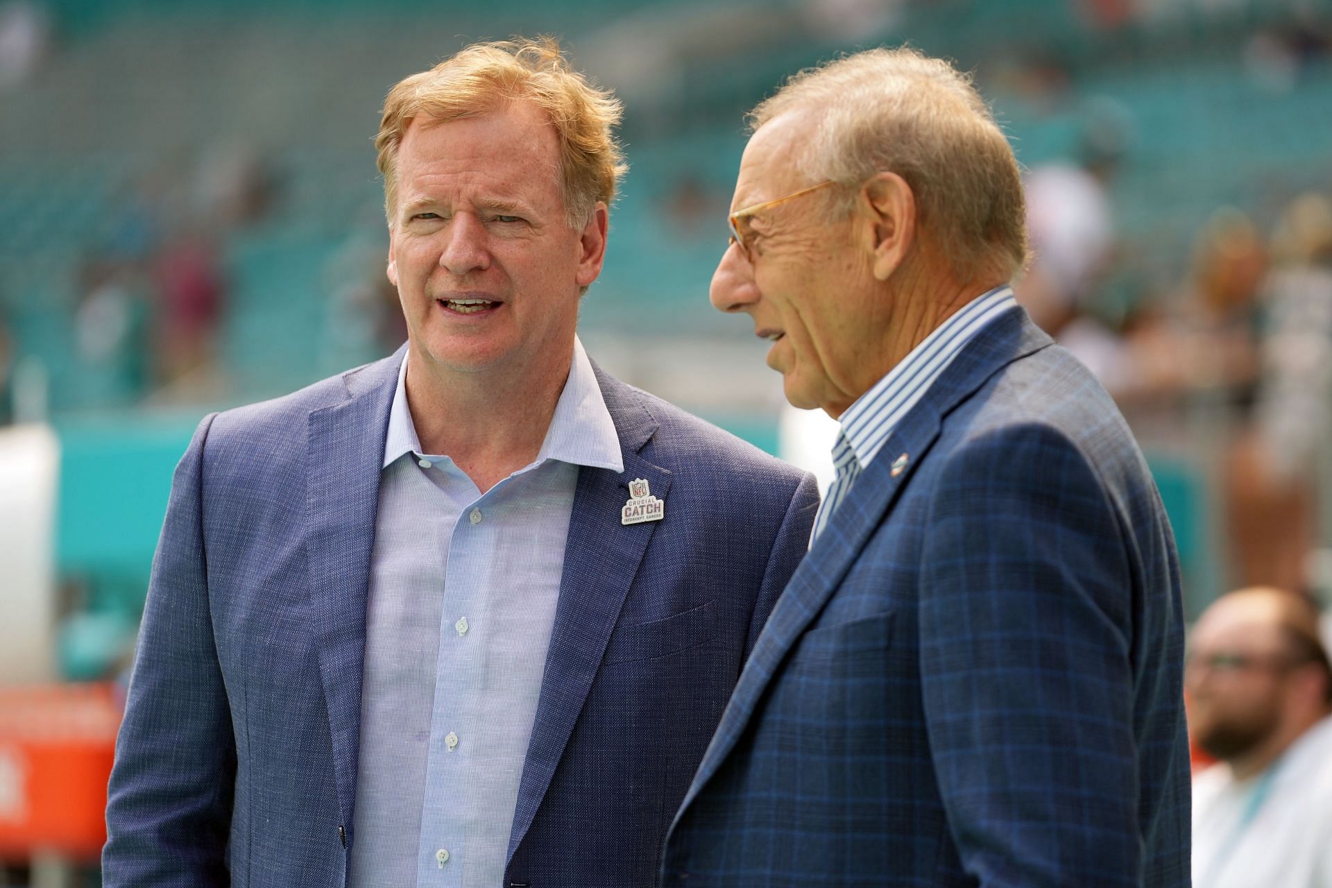 NFL Commissioner Roger Goodell speaks with Miami Dolphins owner, Stephen Ross