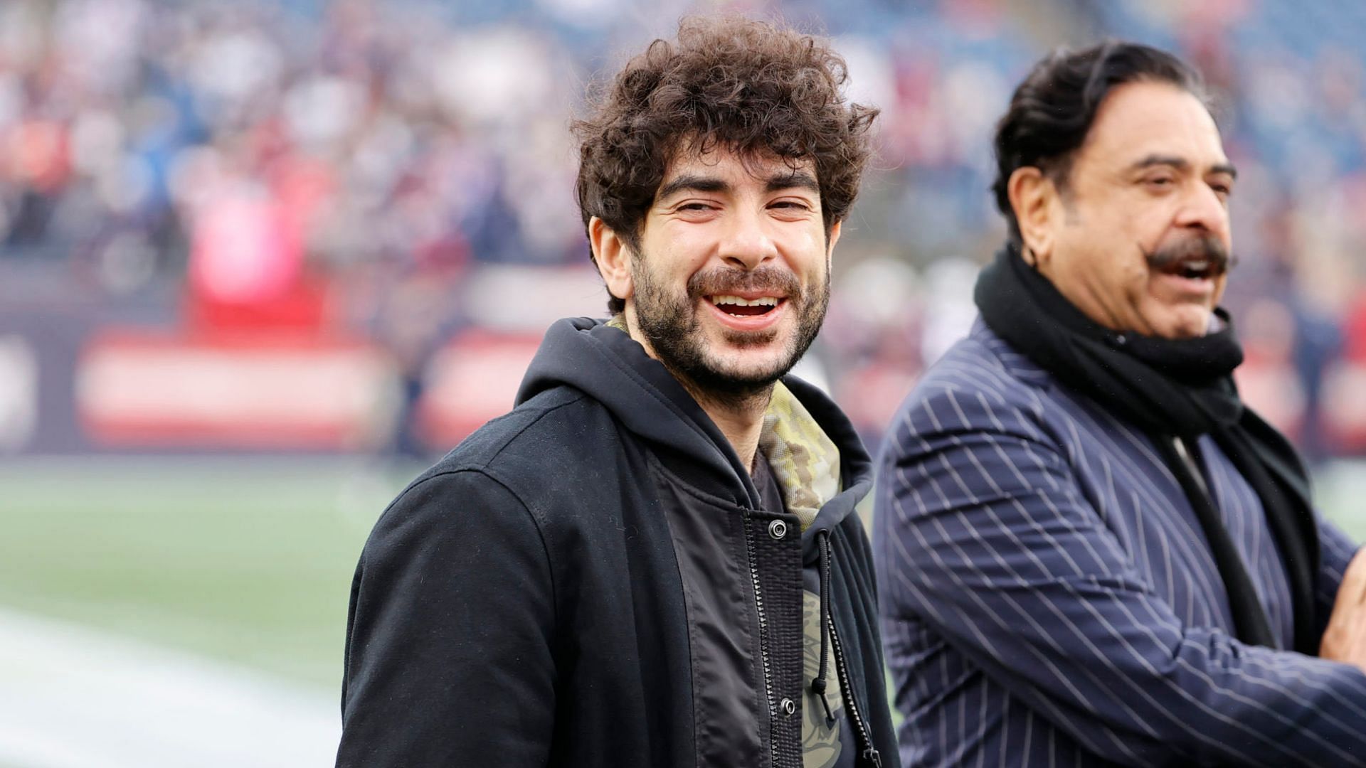 Tony Khan with his dad at Jacksonville Jaguars game