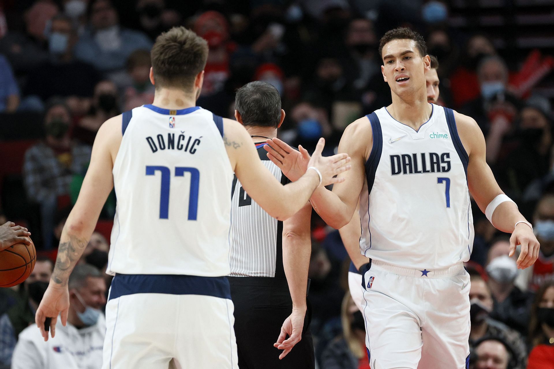 Luka Doncic and Dwight Powell of the Dallas Mavericks