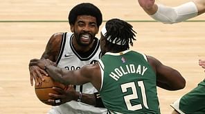 ICYMI: Kyrie Irving and his father share an emphatic, emotional embrace as the former leads the Brooklyn Nets to glory over Giannis' Milwaukee Bucks