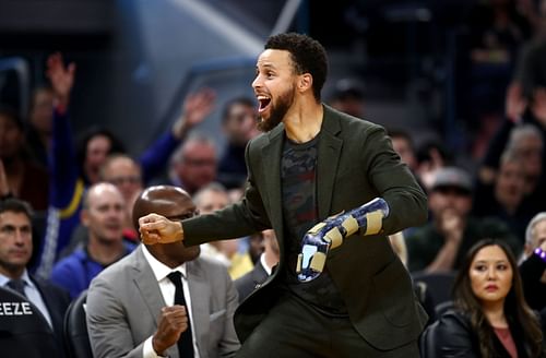 Steph Curry cheers on his teammates Oklahoma City Thunder v Golden State Warriors game in 2019