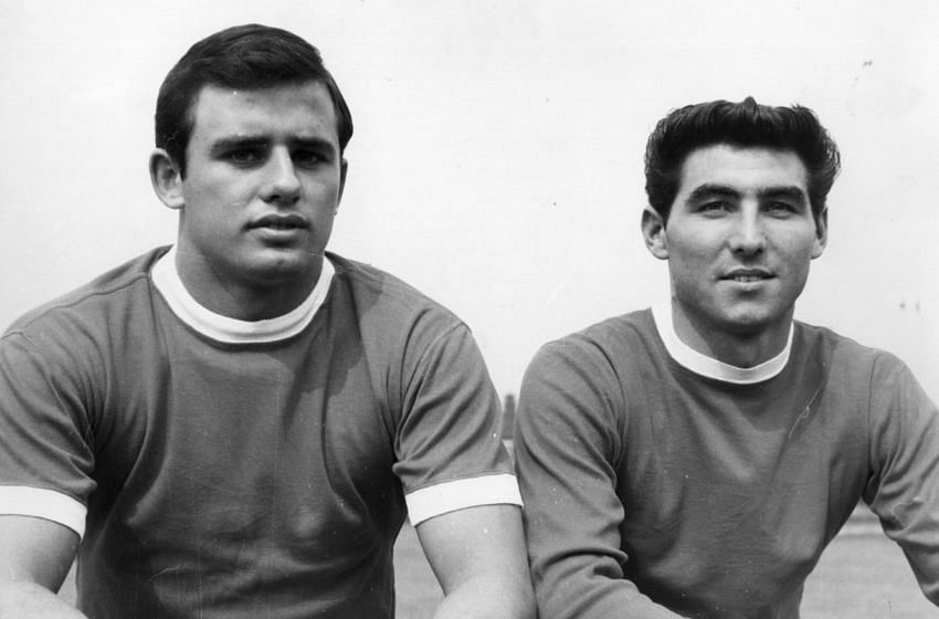Jimmy Nicholson (L) poses for a picture alongside teammate Tony Dunne
