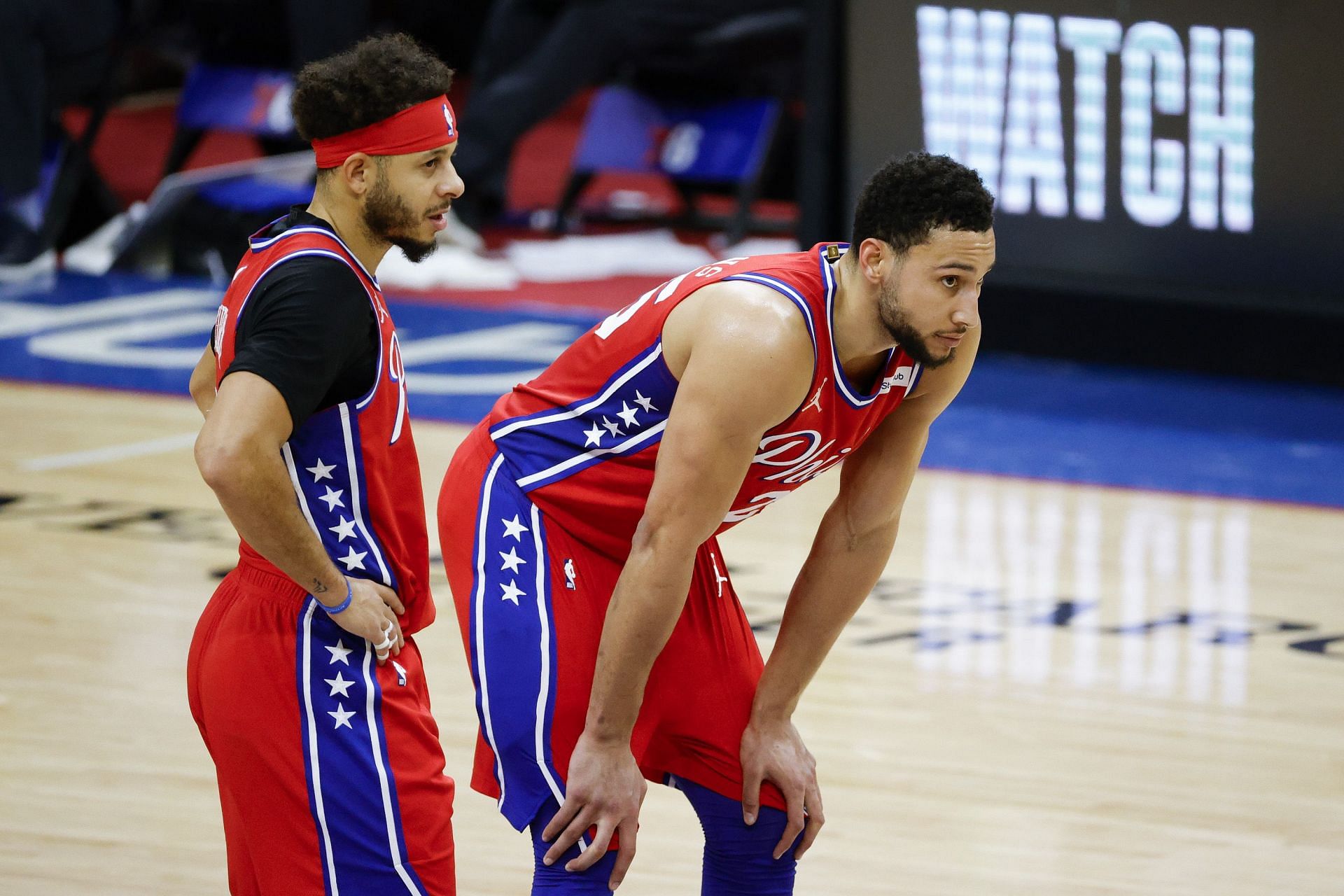 Seth Curry, left, and Ben Simmons have been traded to the Brooklyn Nets.