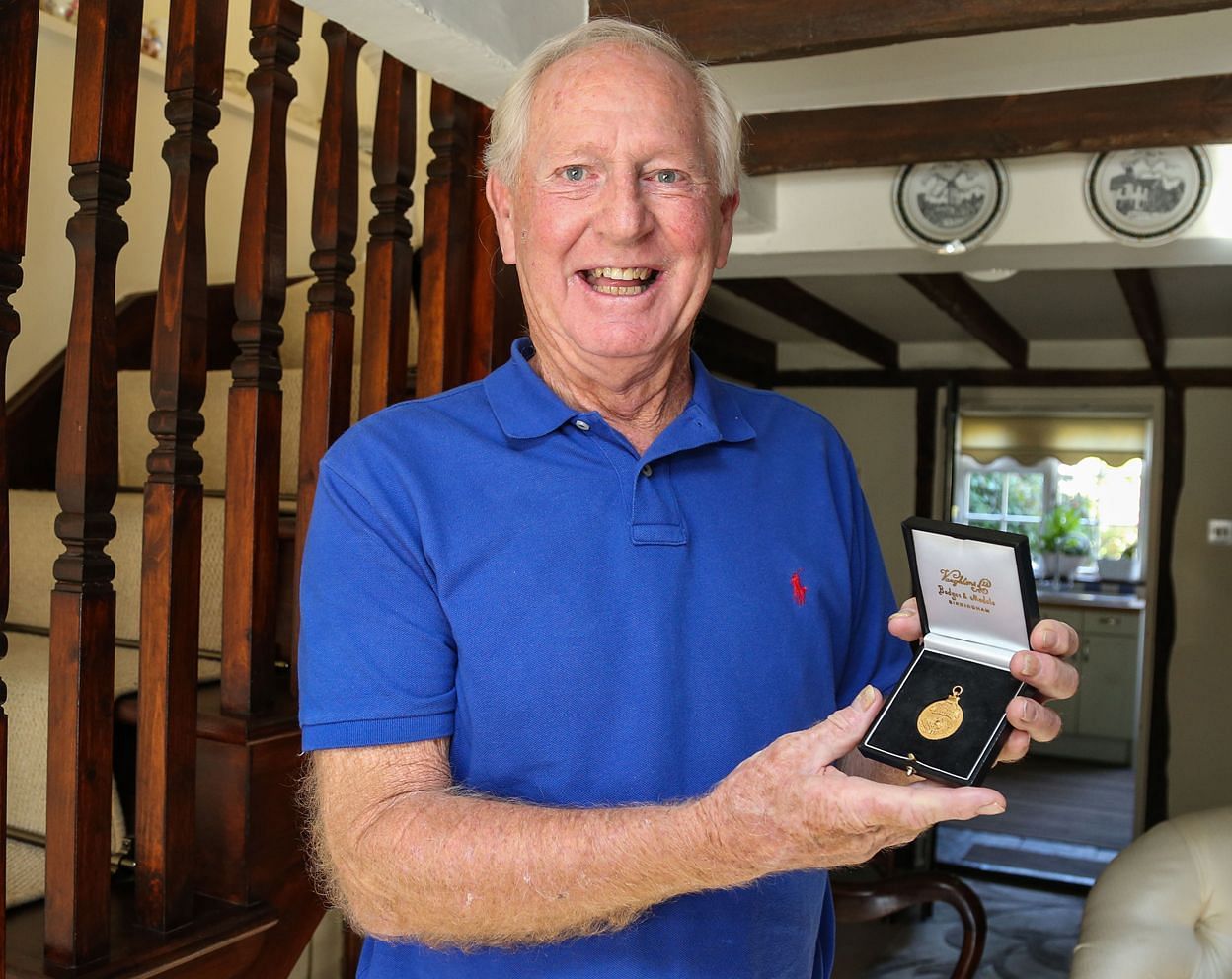 Frank Saul with his 1961 medal