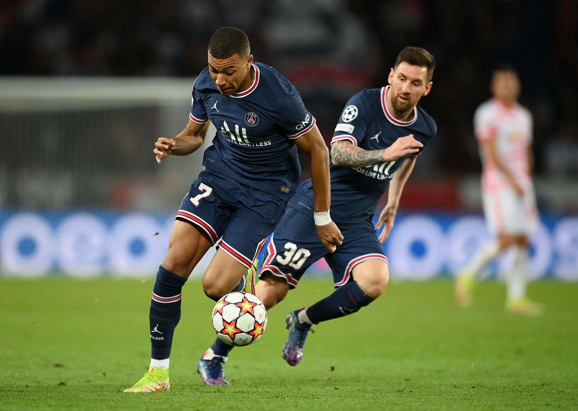 Lionel Messi and Kylian Mbappe in action for the Parisians