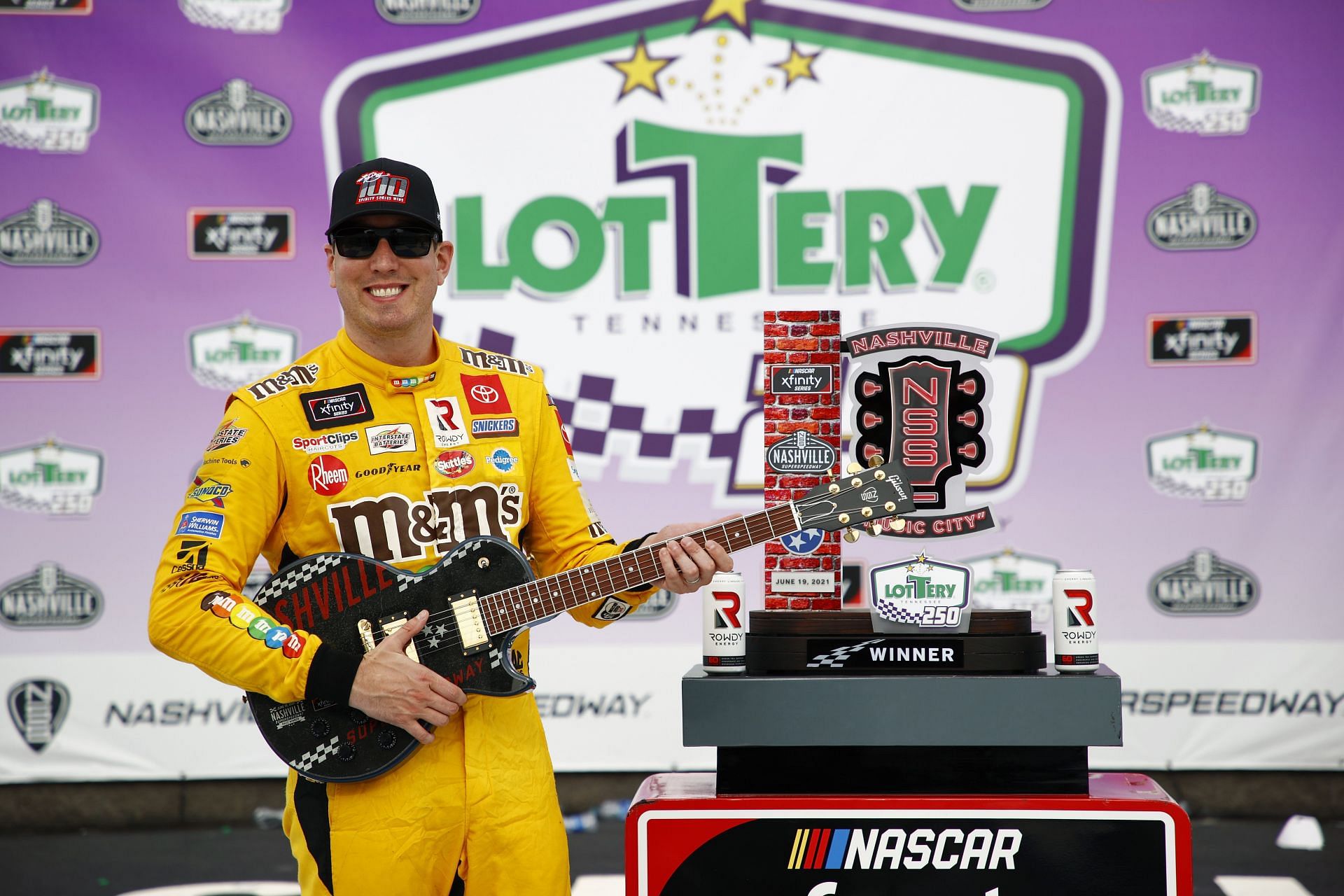 Kyle Busch celebrates in victory lane after winning the 2021 NASCAR Xfinity Series at Nashville Superspeedway.
