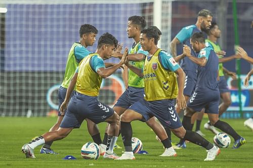 Odisha FC players warm up ahead of a match. [Credits: Odisha FC Twitter]