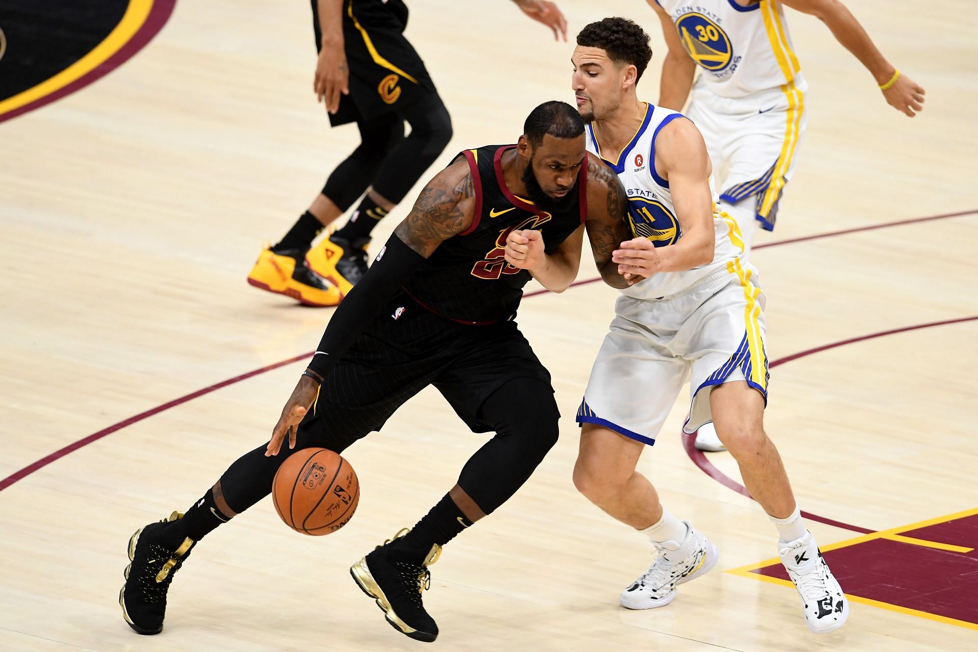 LeBron James and Klay Thompson in action during 2018 NBA Finals - Game Four