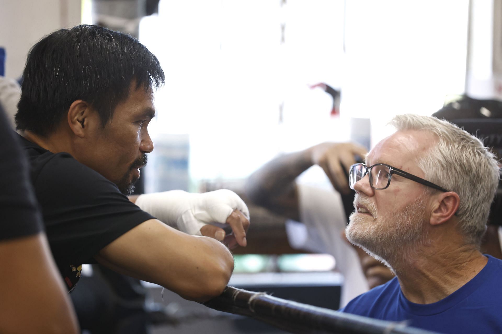 Manny Pacquiao (L) trained with legendary boxing trainer Freddie Roach (R) until his retirement