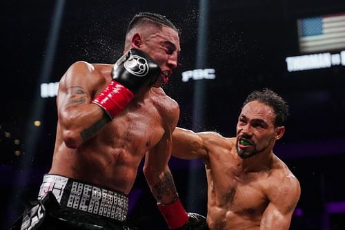 Keith Thurman lans a punch on Mario Barrios