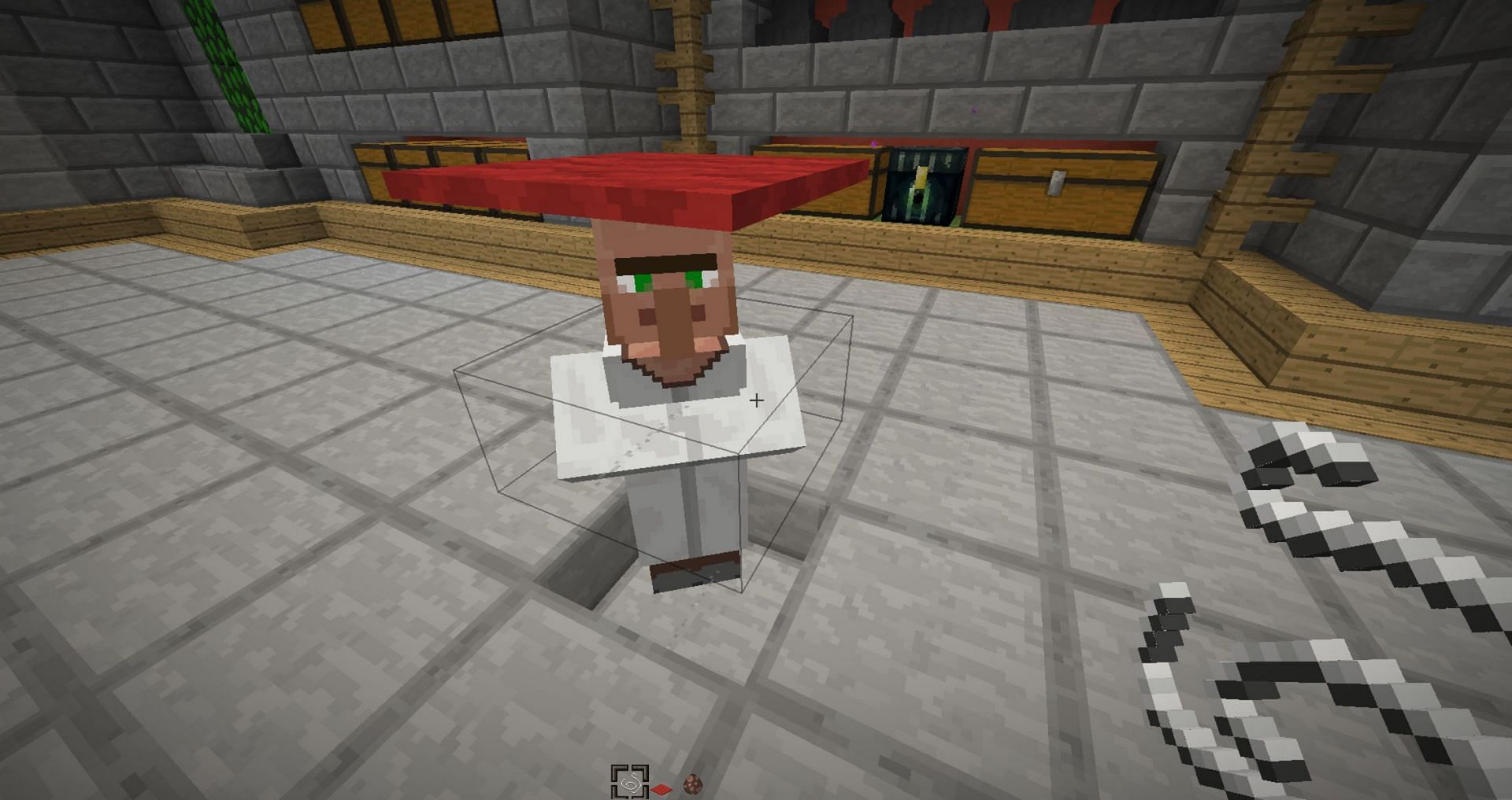 A player uses string and carpet to contain a villager (Image via Mojang)