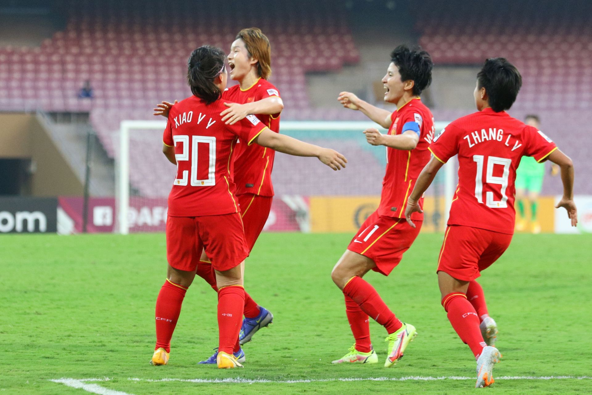 Yuyi Xiao celebrates with her teammates after scoring the injury time winner for China.