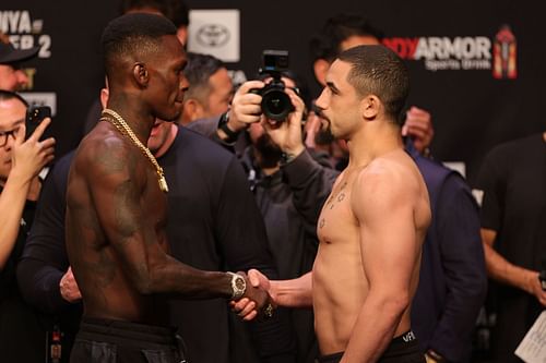 UFC 271: Israel Adesanya shakes hands with Robert Whittaker