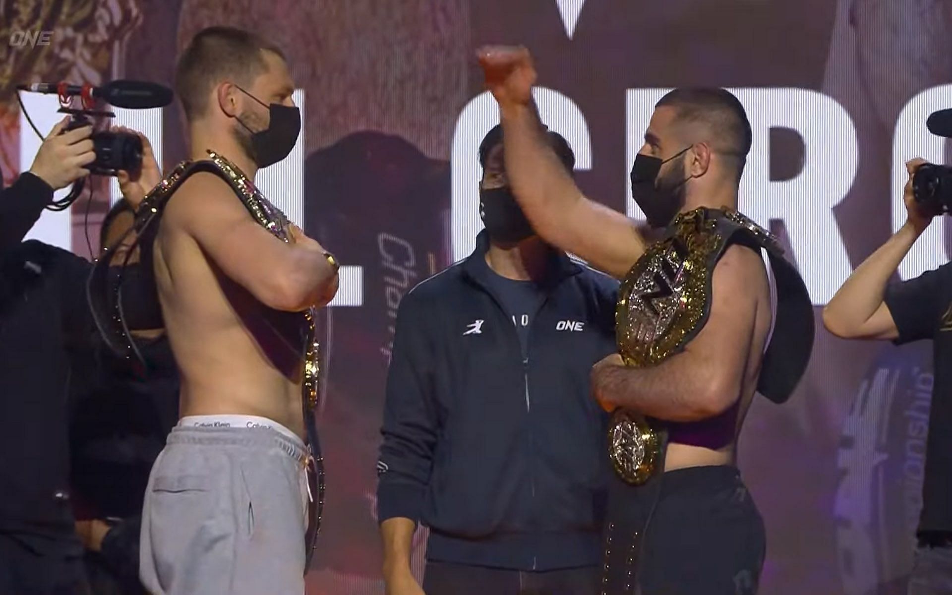 Kiamrian Abbasov (Right) sizes up Reinier de Ridder (Left) during their ceremonial weigh-in and face-off. | [Photo: ONE Championship YouTube]