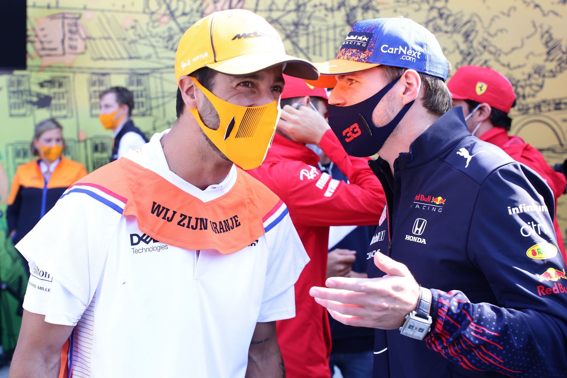 Max Verstappen and Daniel Ricciardo of Australia and McLaren F1 talk on the drivers&#039; parade at the Dutch GP in Zandvoort. (Photo by Peter Fox/Getty Images)