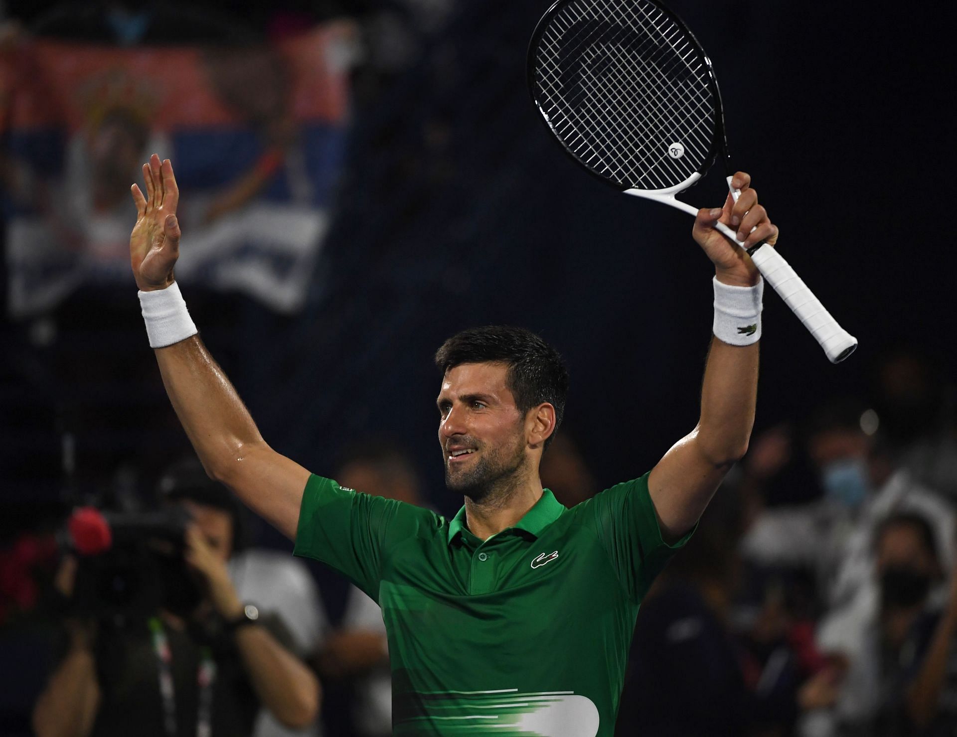 Novak Djokovic celebrates beating Karen Khachanov at the Dubai Duty Free Tennis Chanpionships