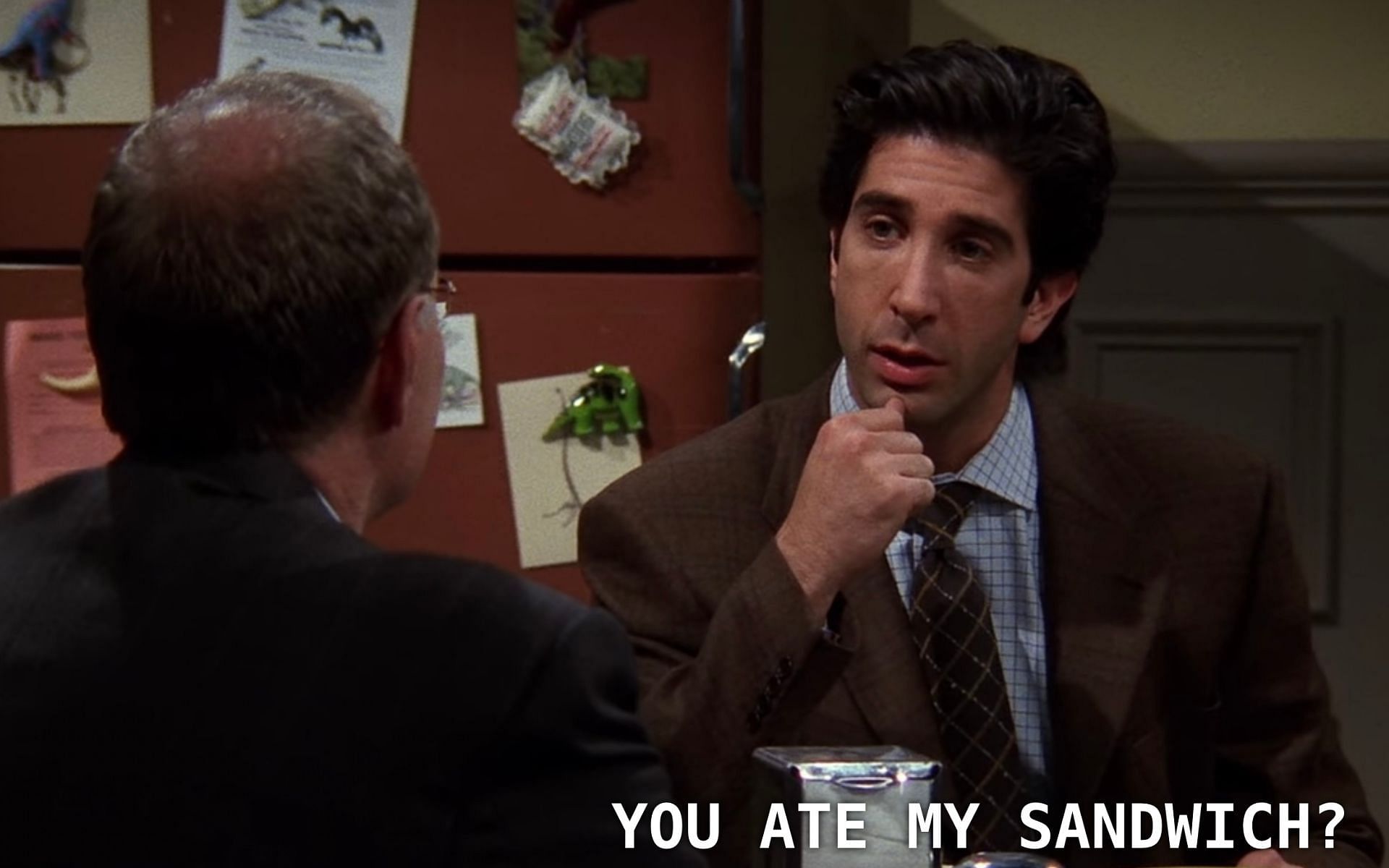 Ross creates a commotion over his stolen sandwich (Image via Warner Bros.)