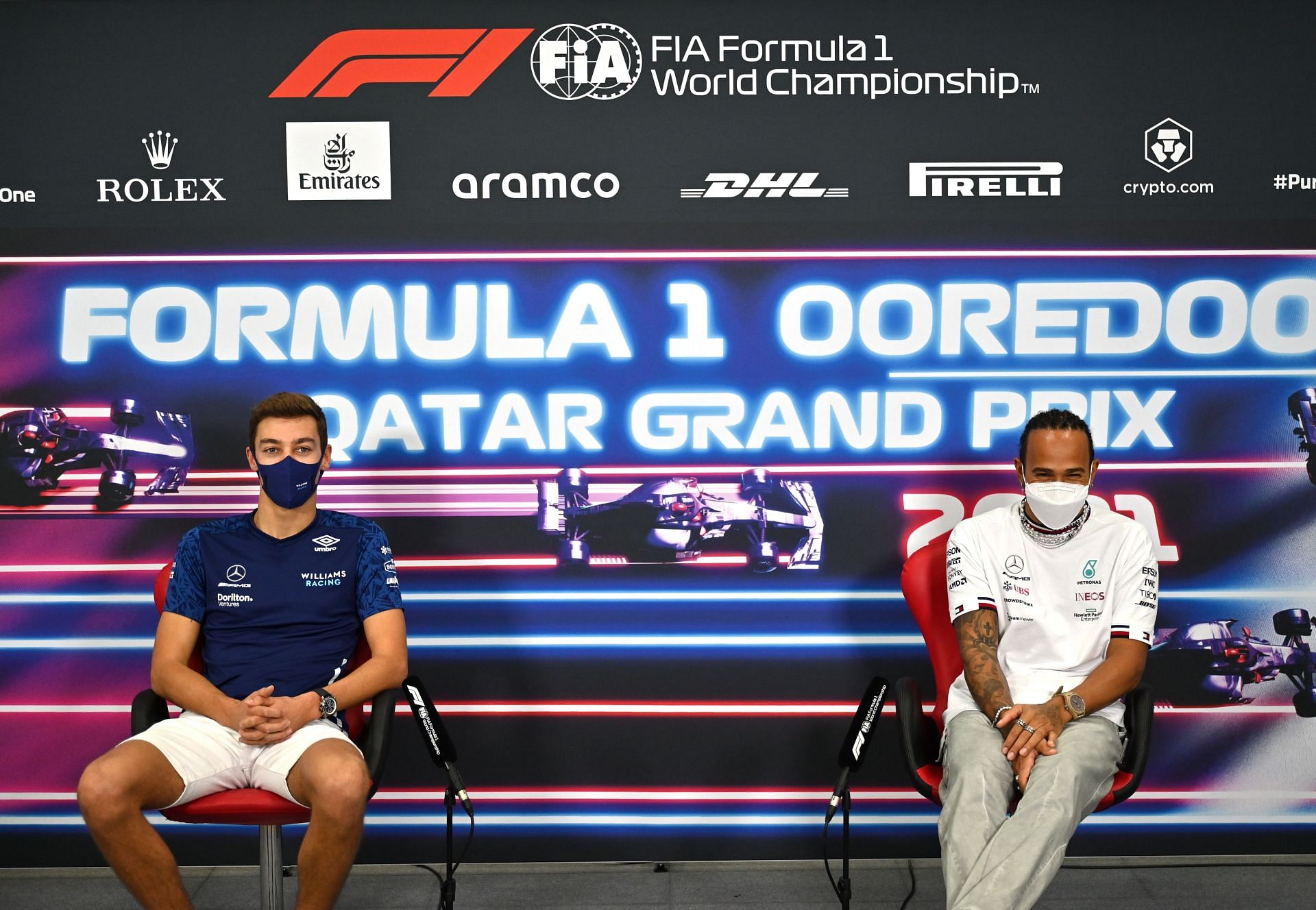 F1 Grand Prix of Qatar - George Russell (left) and Lewis Hamilton (right) attend a press conference (Photo by Andrej Isakovic - Pool/Getty Images)