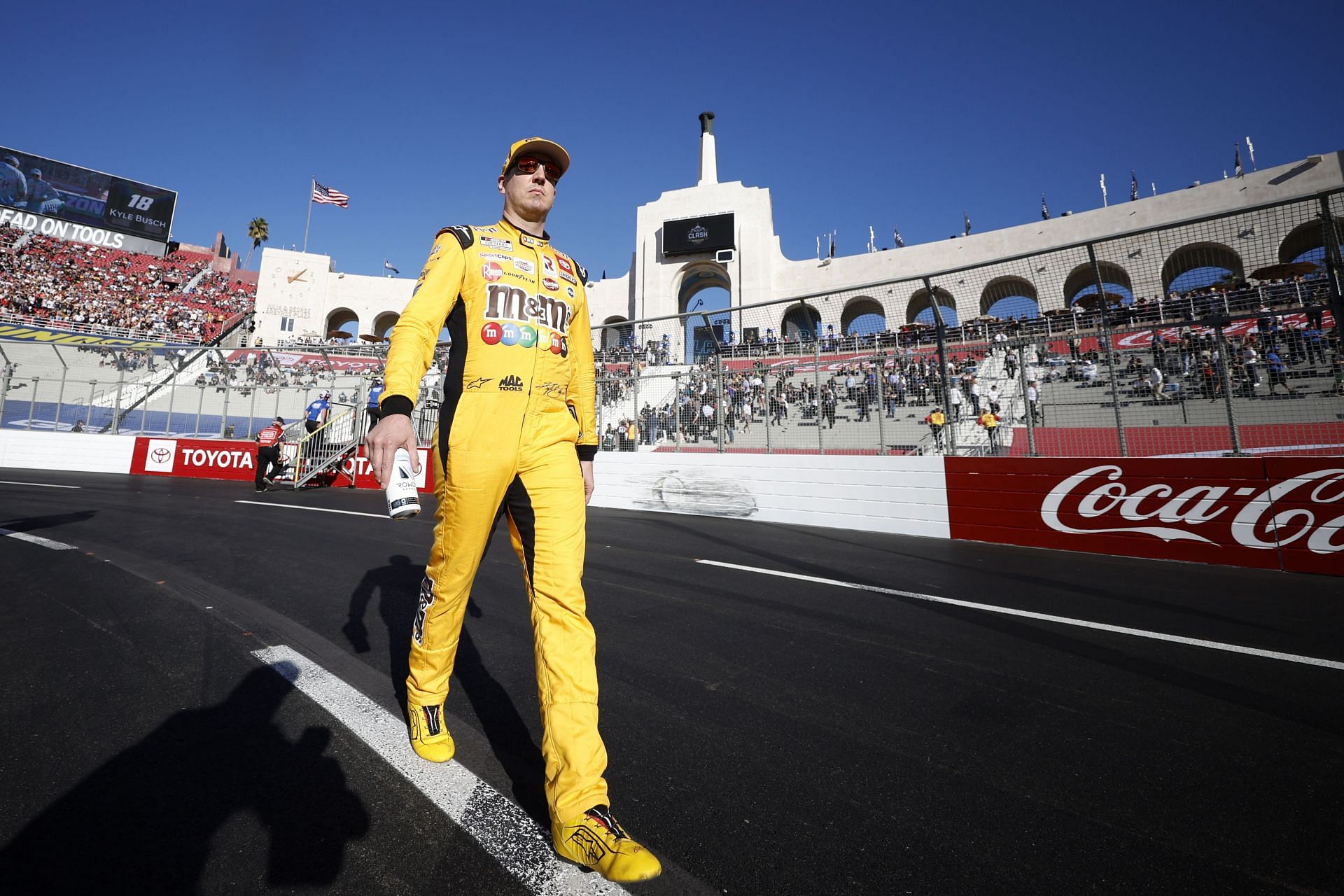 Kyle Busch walks the track before the NASCAR Cup Series Busch Light Clash