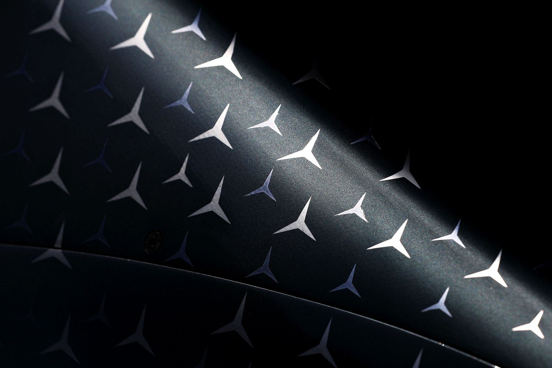 Mercedes stars are seen on the engine cover of their car in Monaco (Photo by Mark Thompson/Getty Images)