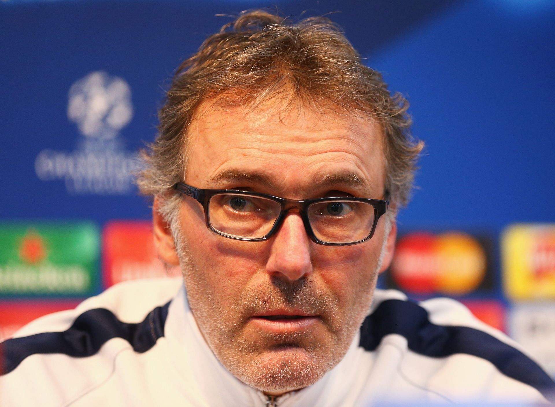 Laurent Blanc addresses the press before a game.
