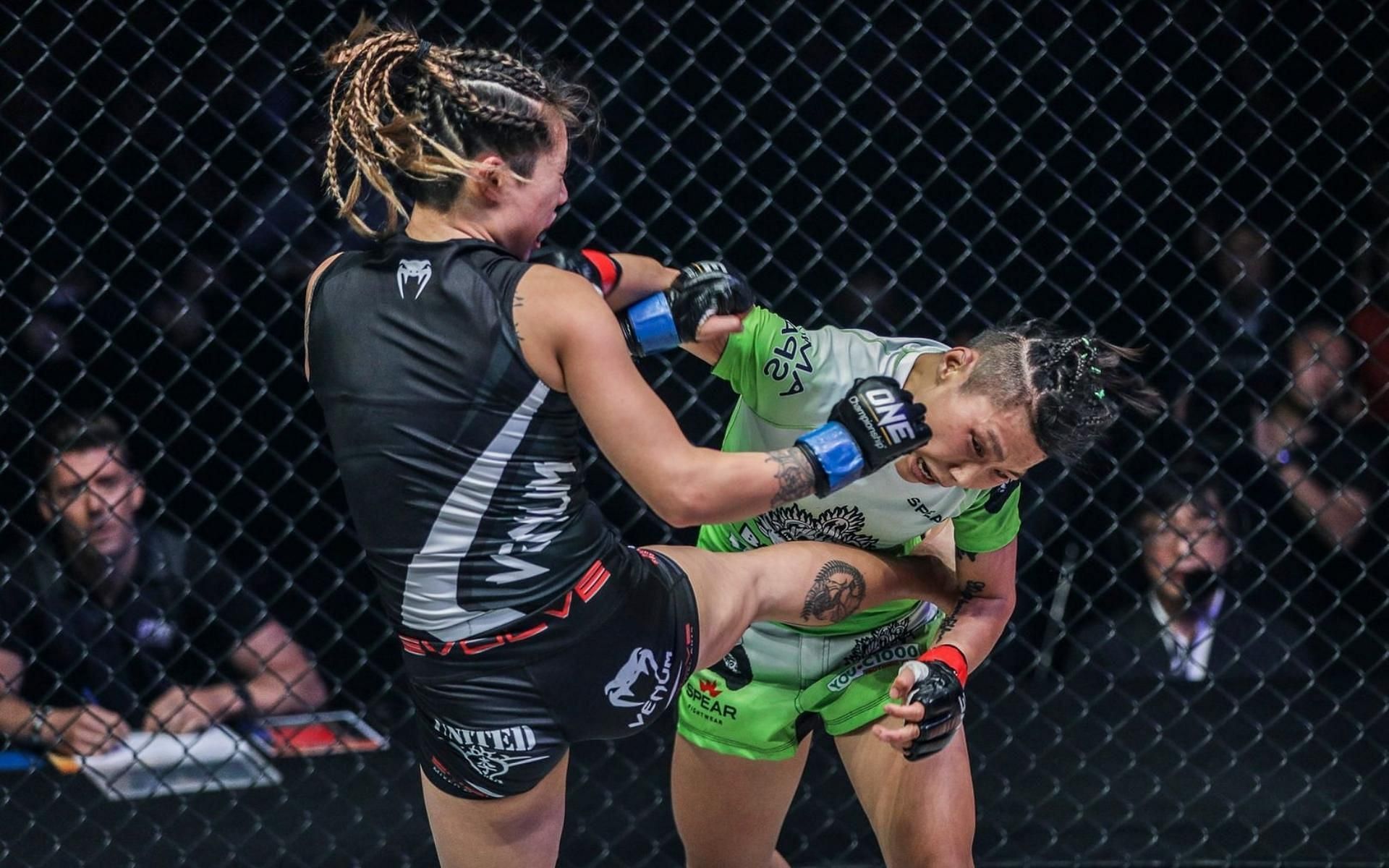 The first fight between Angela Lee (left) and Xiong Jing Nan (right) for the ONE Championship strawweight belt was one for the ages. (Image courtesy of ONE Championship)