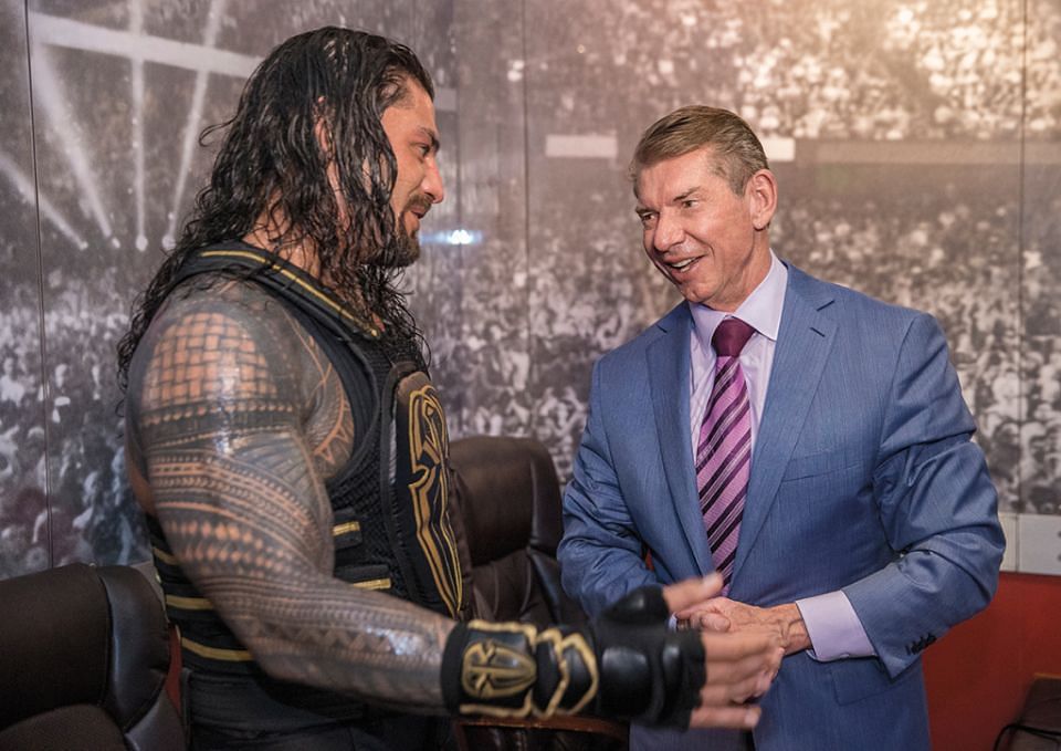 Roman Reigns and Vince McMahon backstage