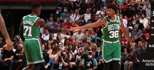 Dennis Schroder and Marcus Smart of the Boston Celtics. (Photo: Courtesy of NBA.com)