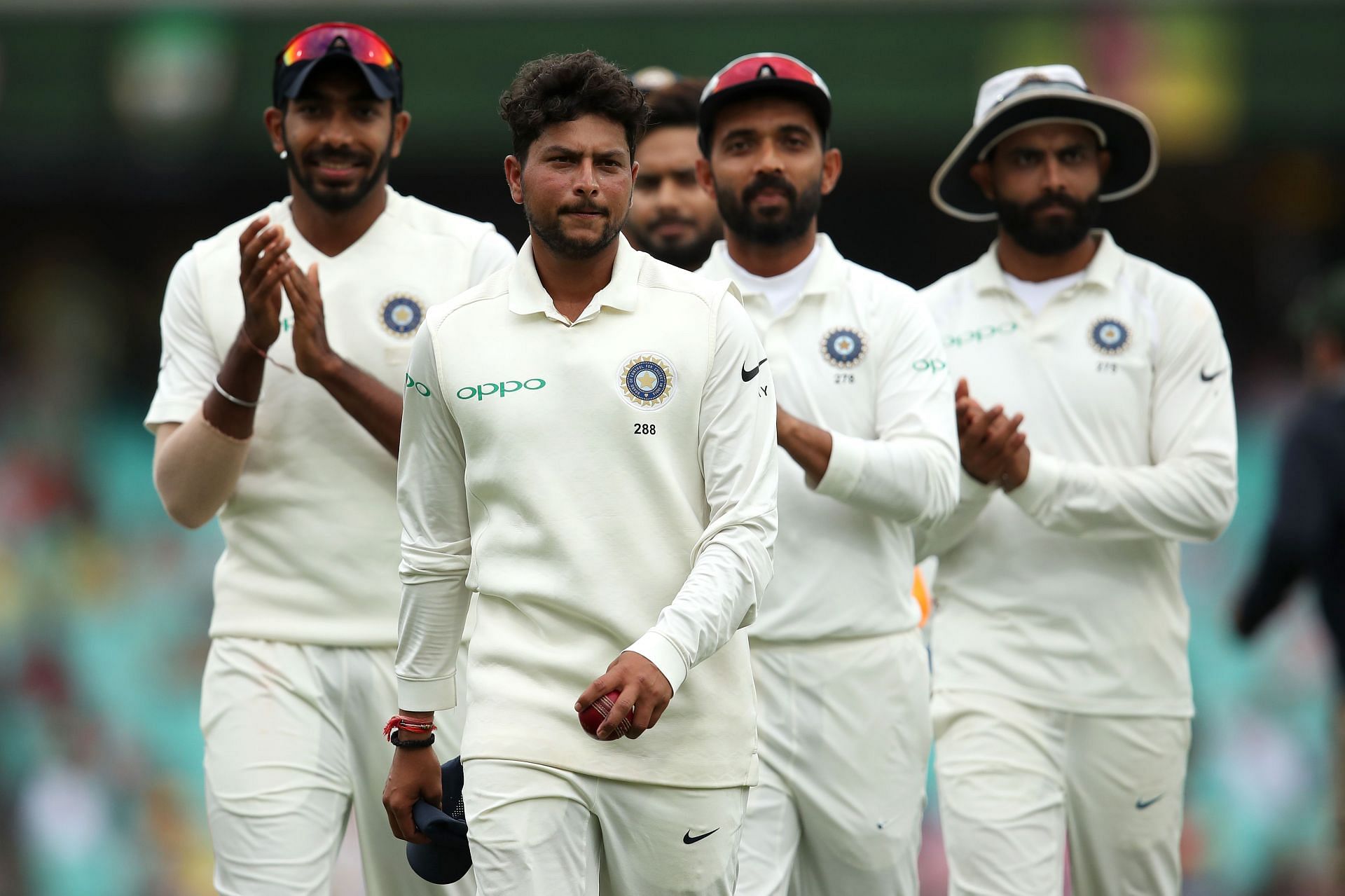 Kuldeep Yadav (second from left) could get a game if Ashwin is unfit.