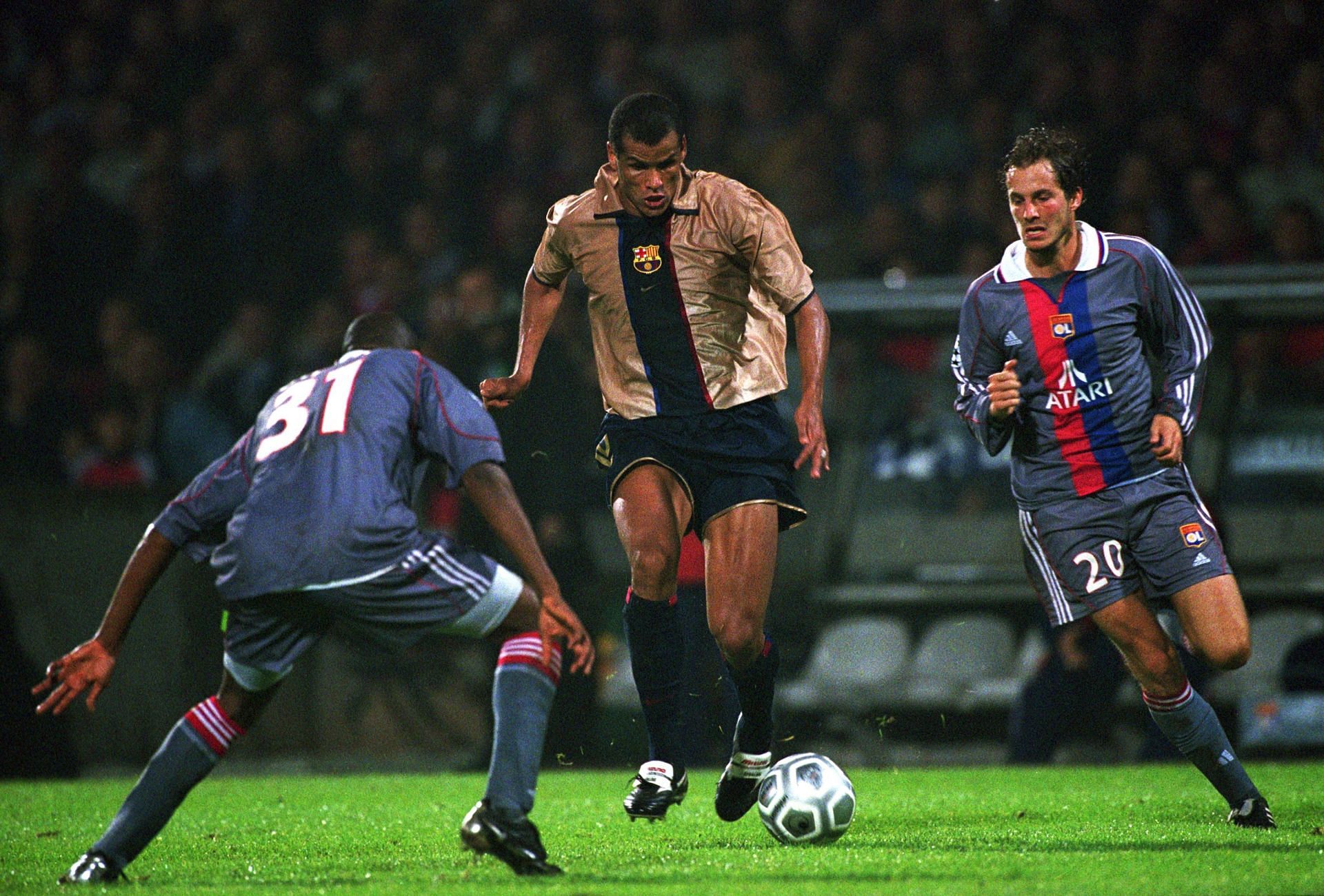 Rivaldo (centre) in action for Barcelona against Lyon