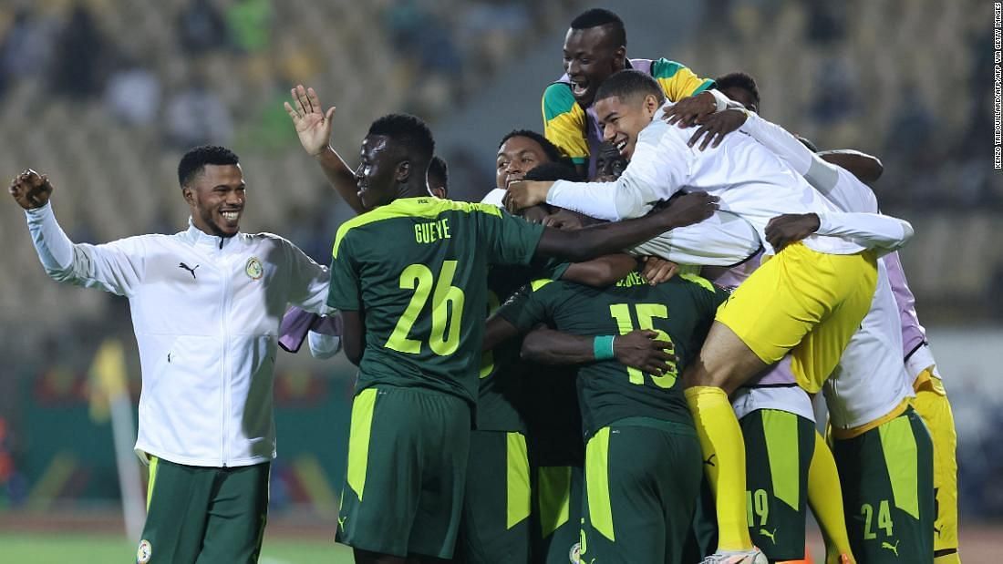 Senegal players celebrate their win over Burkina Faso in the semi-finals of AFCON