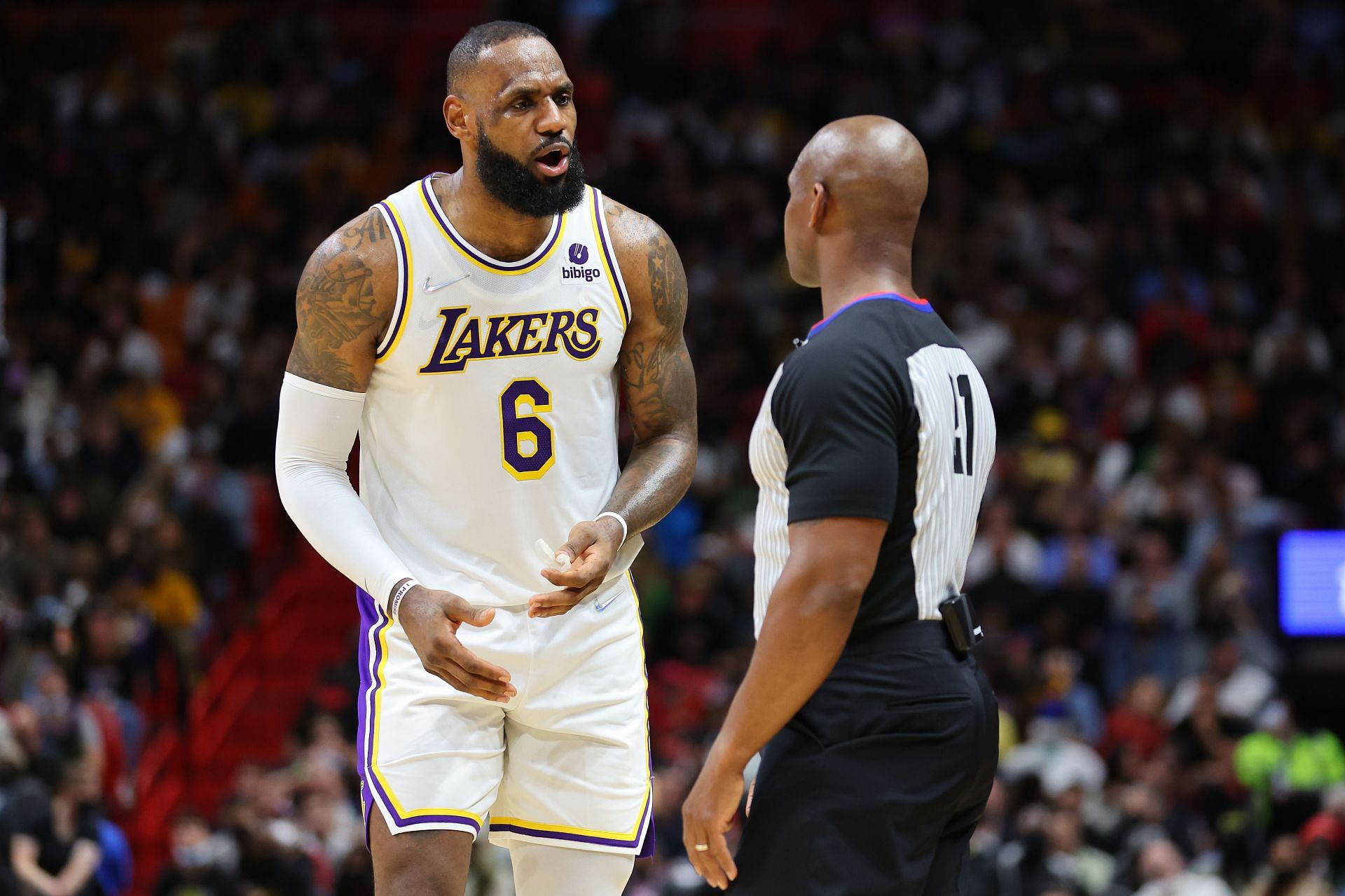 LeBron James of the LA Lakers talking to a referee.