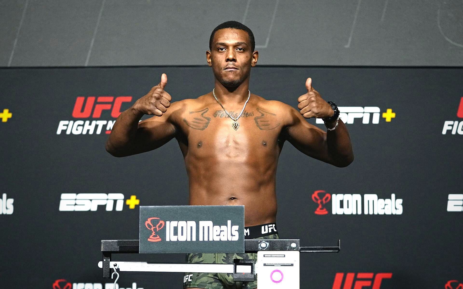Jamahal Hill poses on the scale during the UFC Fight Night weigh-in at UFC APEX on February 18, 2022 in Las Vegas, Nevada.