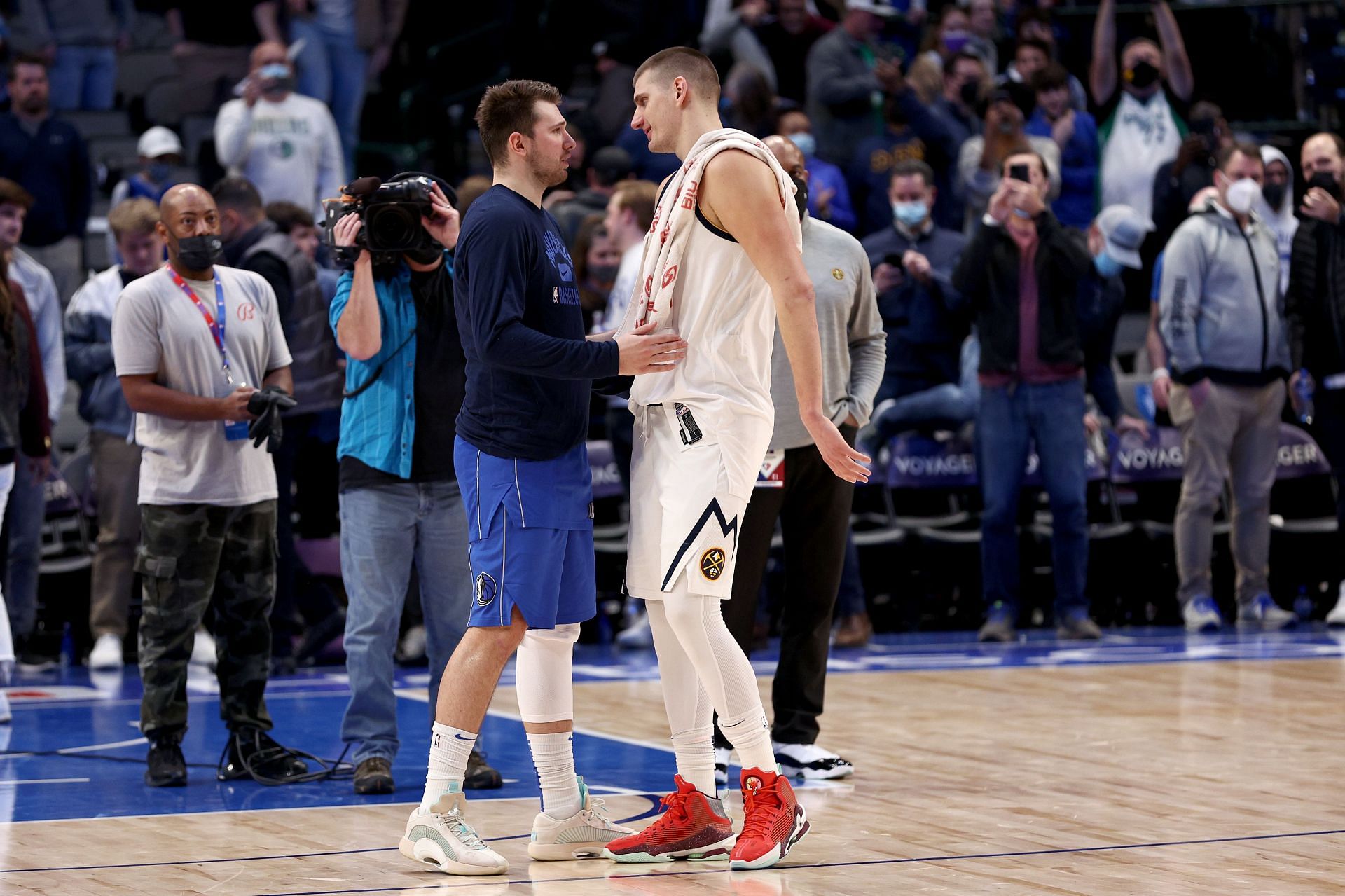 Luka Doncic and Nikola Jokic greet each other during the Denver Nuggets v Dallas Mavericks game.