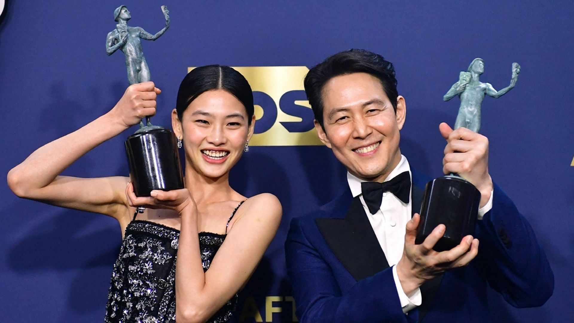 &#039;Squid Game&#039; actors Jung Ho-yeon and Lee Jung-jae at the SAG Awards 2022 (Image via Getty)