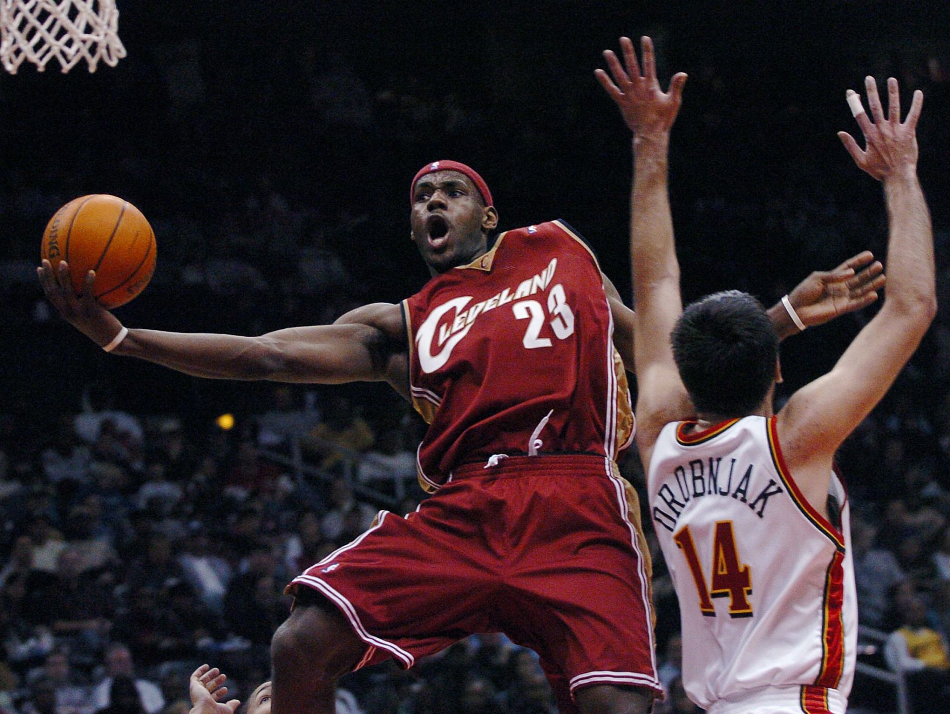 James going to the basket during an NBA game in his early years in the league.