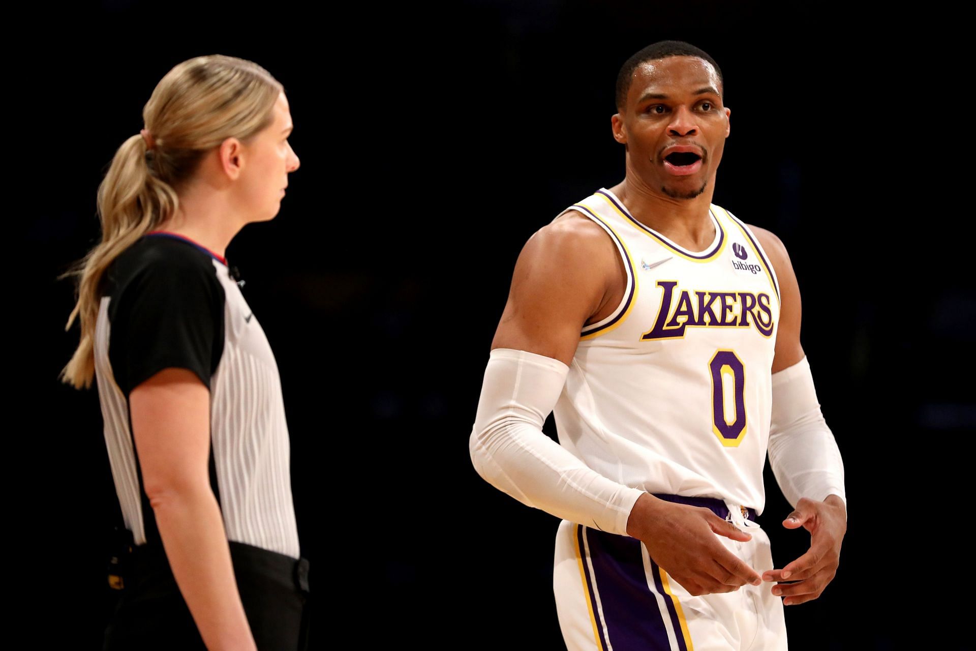 Russell Westbrook of the LA Lakers talks with an official.