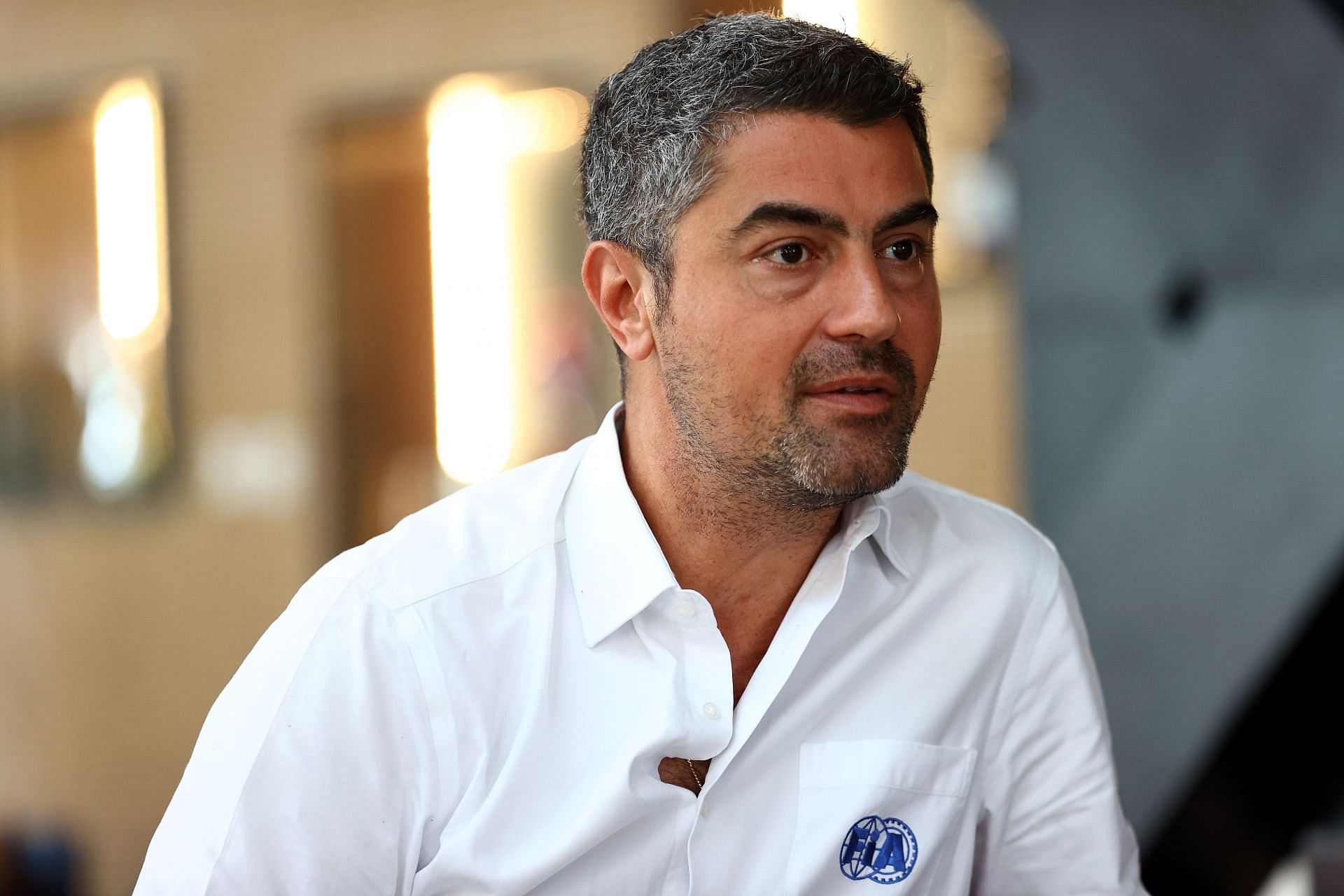 FIA Race Director Michael Masi is interviewed ahead of the 2021 season finale (Photo by Bryn Lennon/Getty Images)