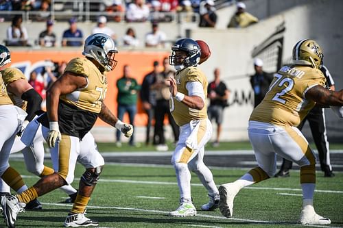 Russell Wilson attempts a pass during the 2021 NFL Pro Bowl