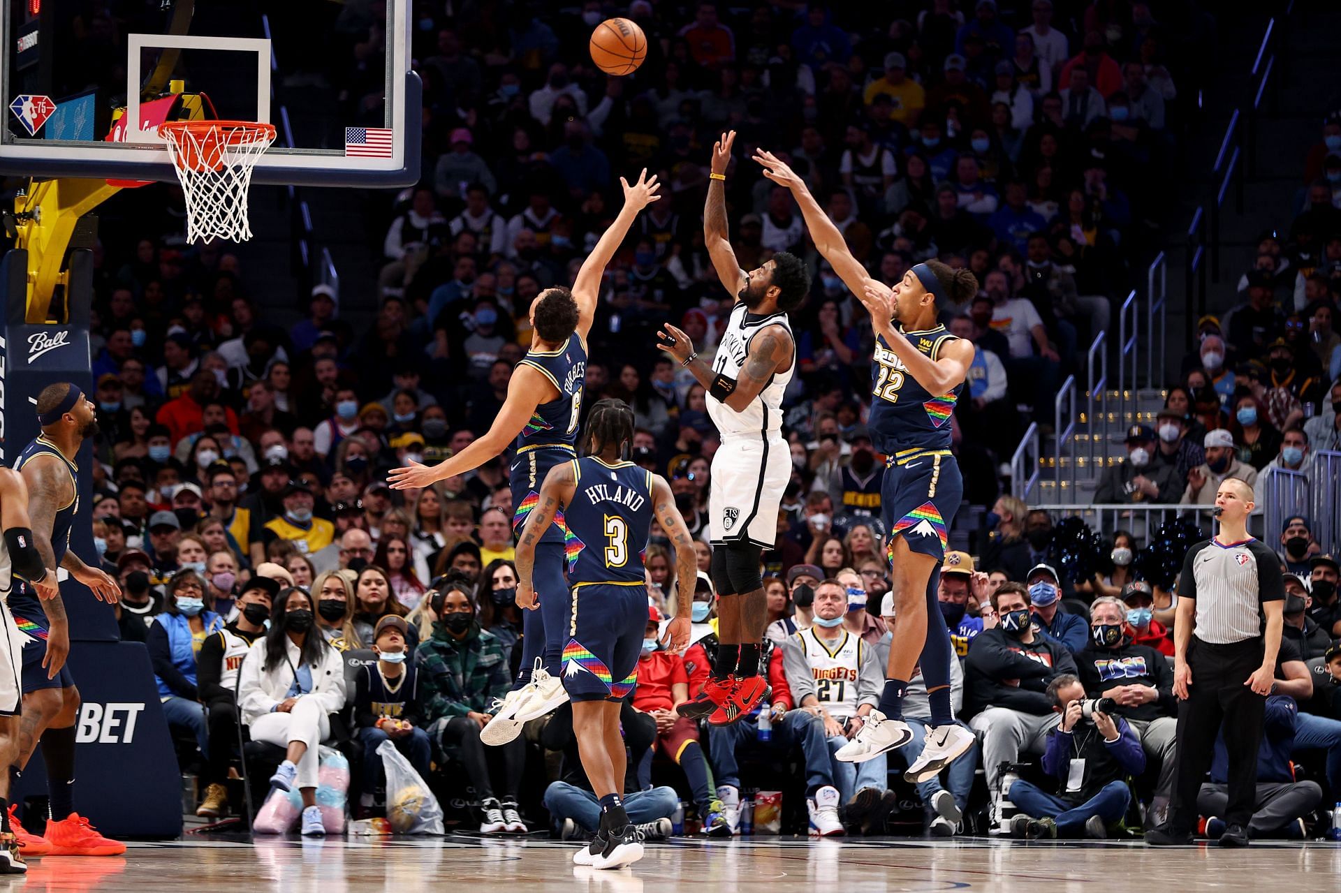 Kyrie Irving scores against the Denver Nuggets